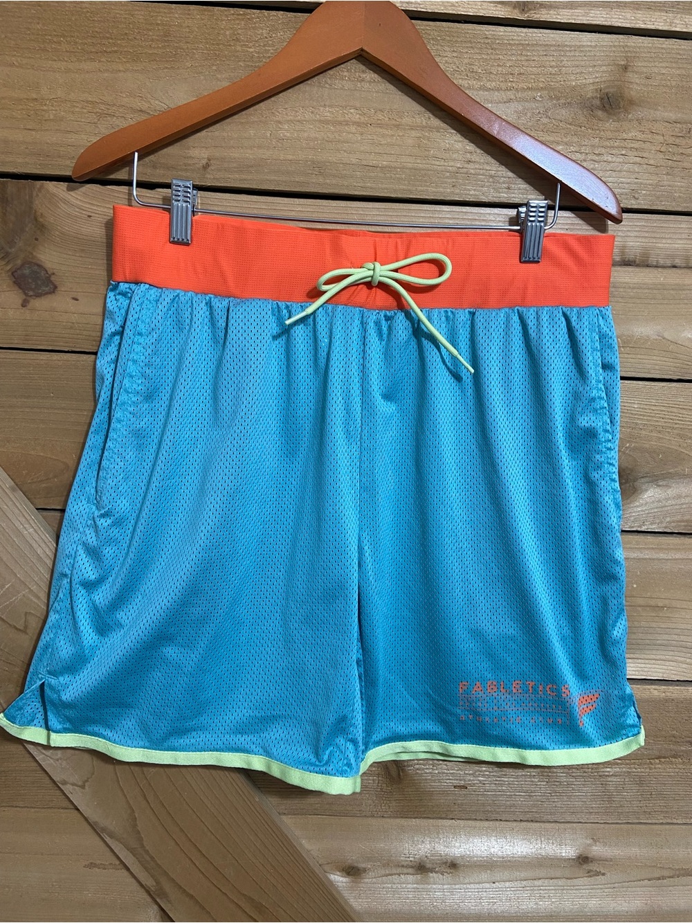 Fabletics Aqua Athletic Shorts with Orange Waistband and Lime Trim